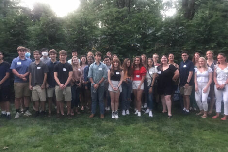Students standing outside at welcome event held in New Jersey