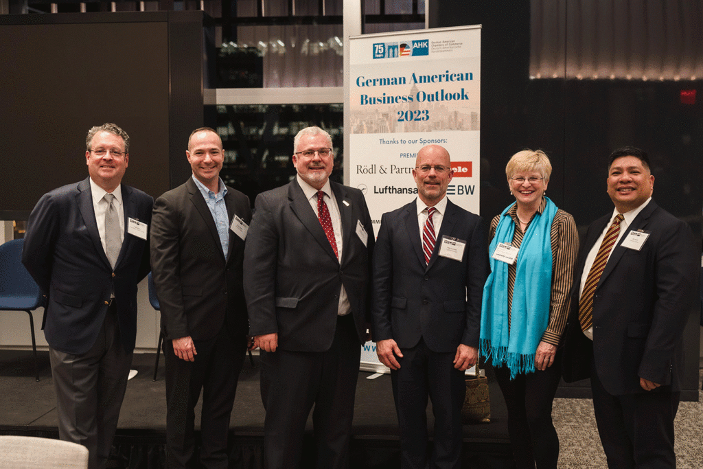 Standing in front of a sign at the GABO event in New York from left are Paul D. Fulmer, '91, Brian Samble, Dean of Students; Maurice Luker, Executive Director, of Corporate, Foundation, and Government Relations; Mike Summers, Associate Vice President of the Gateway Career Center; Margarete Lamb-Faffelberger, Professor Emeritus of the German and Director of the Max Kade Center; and Rico Reyes, Director of Art Galleries and Curator of Art Collections
